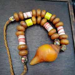 Moroccan Handcrafted Resin Amber Glass Vintage Jewelry African Necklace. Crafted with precision and passion, each piece is a unique reflection of traditional Moroccan artistry. Our artisans skillfully combine vibrant resin, lustrous amber glass, and intricate detailing to create a statement piece that transcends trends.
