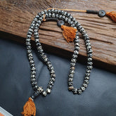 Exquisite Vintage Himalayan Yak Bone 108 Beads Rosary Mala Embellished with Sacred Inscriptions: A Revered Artifact of Spiritual Wisdom and Tranquility