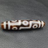 Smooth Skin Himalayan Tibetan9 eyes Dzi Agate Bead: A Rare Gem from the Past