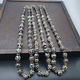 Black skunk venetian african trade beads dotted beads east oasis collection