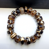 Tibetan nepalese dzi beads bracelet handmade cylindrical beads, gold spacers