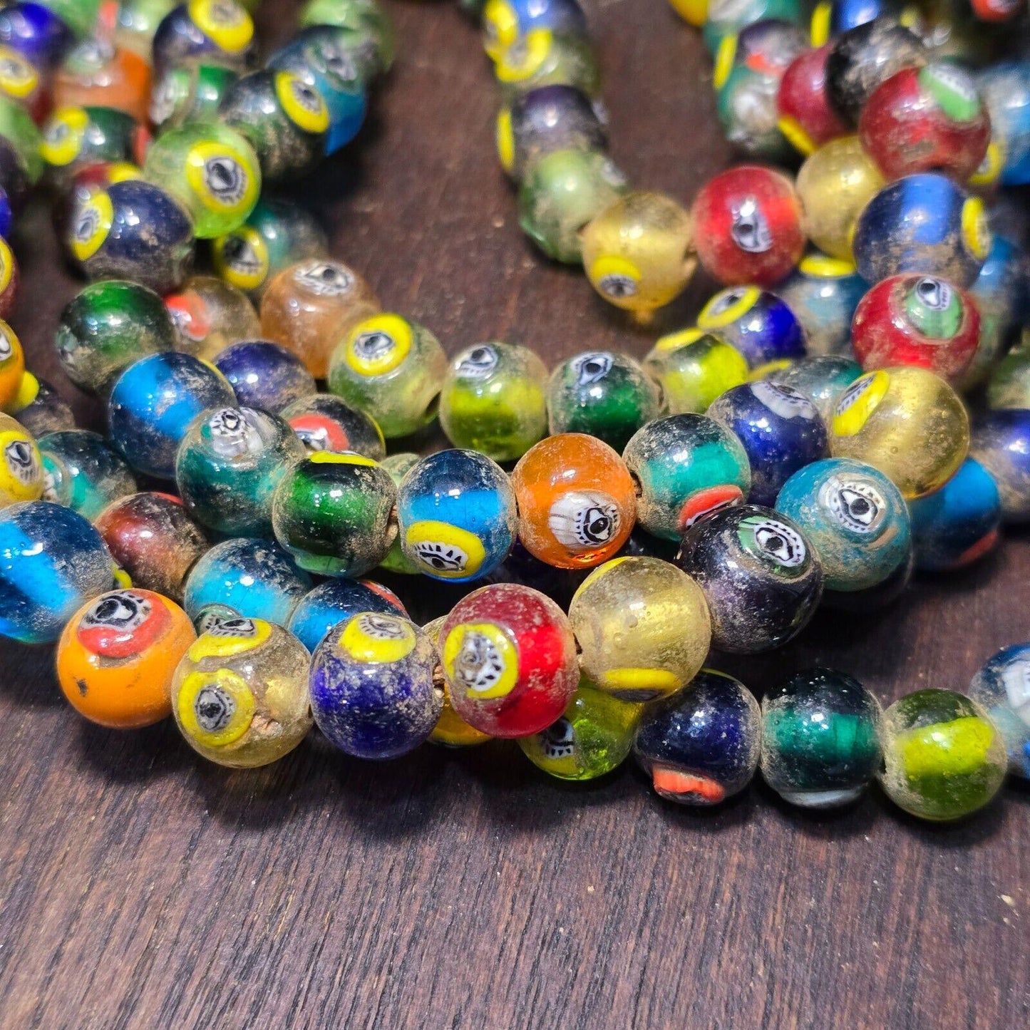Vintage eye symbol embedded venetian inspired beads strand necklace