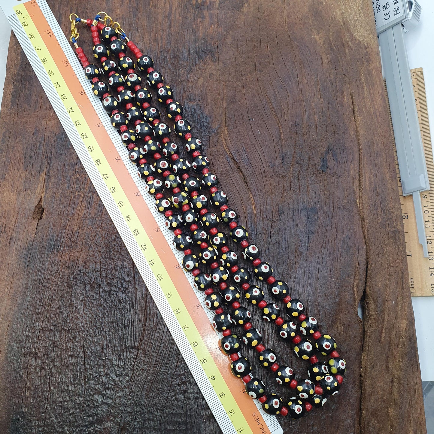 Black venetian style hundred red eyes skunk beads necklace10mm & 20 inches long