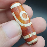 INDO TIBETAN ETCHED LINE DECORATED TAPERED TUBE 2 EYE DZI