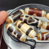 Lot 8 Sacred Treasures: Unveiling the Mystique of Tibetan Antique Dzi Beads