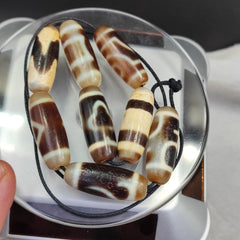 Lot 8 Sacred Treasures: Unveiling the Mystique of Tibetan Antique Dzi Beads