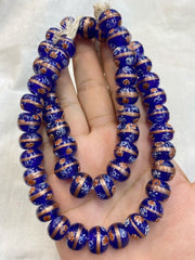 "Vintage Murano Millefiori art glass beaded strand, featuring beautiful and intricate 13MM glass beads in a vibrant, multi-colored design. Measuring 52CM long, this stunning piece showcases the renowned craftsmanship of Murano glassmakers and is a true treasure for collectors of vintage jewelry and art glass."