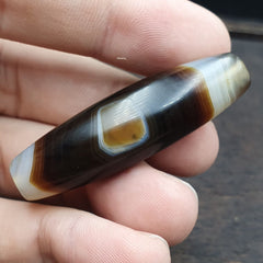 Antique Yemeni Collectible Agate Bead showcasing Natural Eye Pattern and Banded Agate design, a unique and rare gemstone jewelry piece.