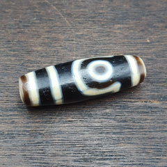Antique Agate Tibetan Gzi Pendant with Two Eyes - Traditional Old Amulet representing Tibetan culture and spirituality.
