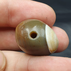 Antique Tibetan Suleimani Agate Bead: A Rare Gem from the Past.