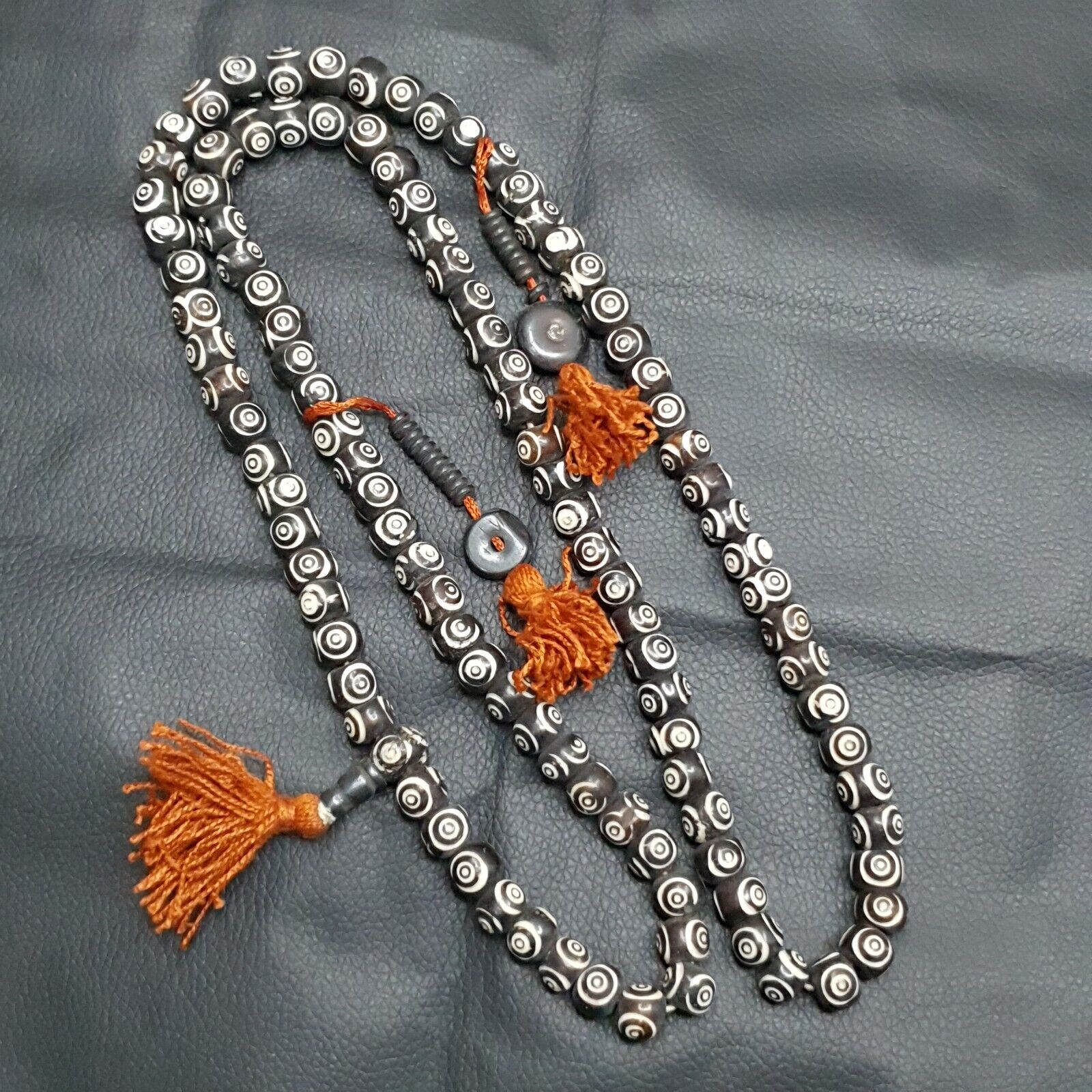 Vintage Himalayan Carved Bone 108 Beads Rosary Mala - Intricately designed rosary featuring authentic Himalayan carved bone beads, totaling 108 beads for meditative practice
