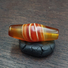 Antique Yemeni Agate Natural Eye Agate Bead with intricate and unique pattern, showcasing rare craftsmanship and stunning natural beauty.