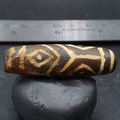 Antique south asian burmese old pyu tribe pumtek petrified wood stone bead