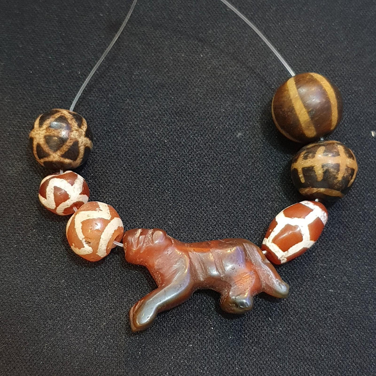 Antique animal figurine carving agate etched agate and pumtek beads lot