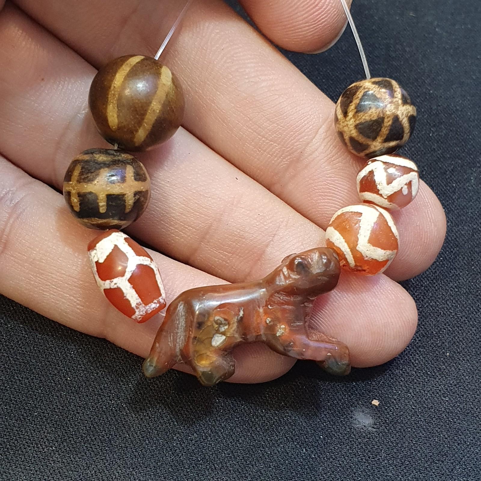 Antique animal figurine carving agate etched agate and pumtek beads lot