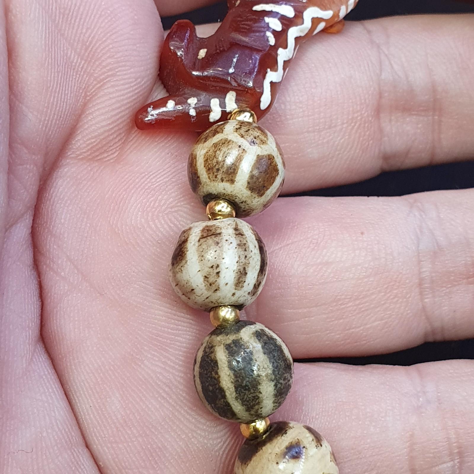 Antique tibetan agate animal figurine with burmeese pumtek beads bracelet