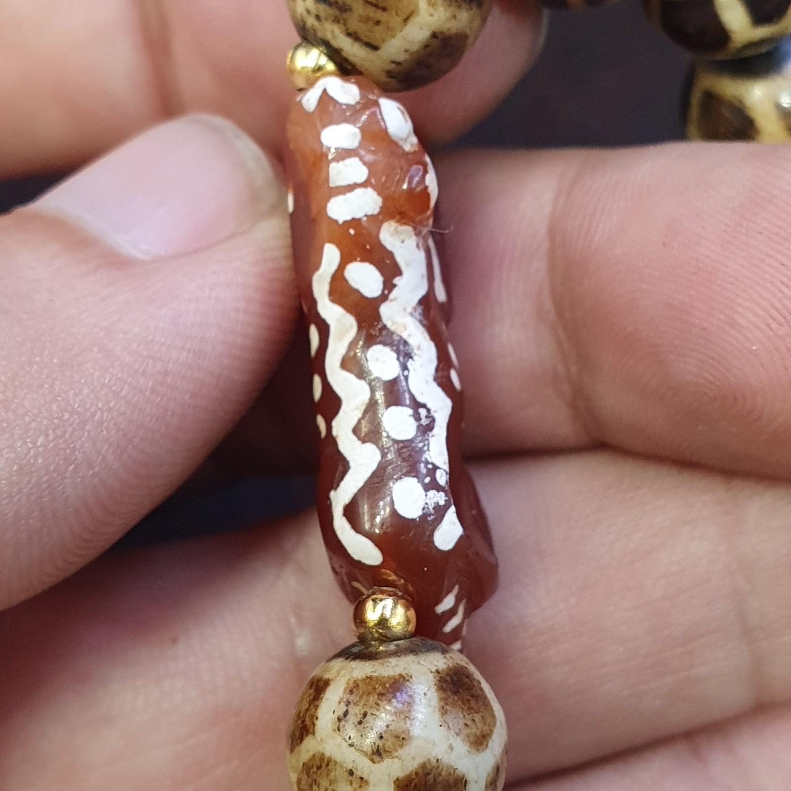 Antique tibetan agate animal figurine with burmeese pumtek beads bracelet