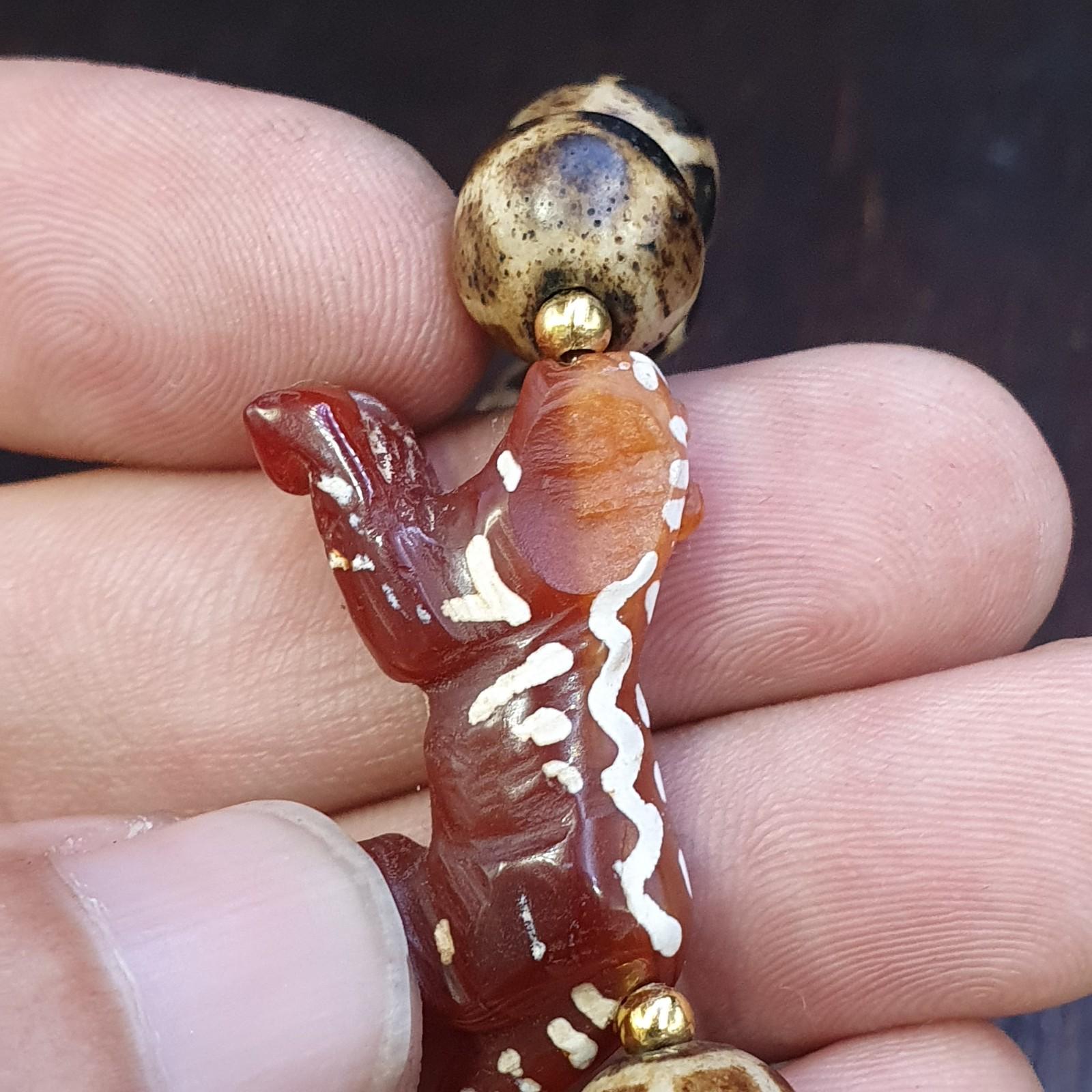 Antique tibetan agate animal figurine with burmeese pumtek beads bracelet