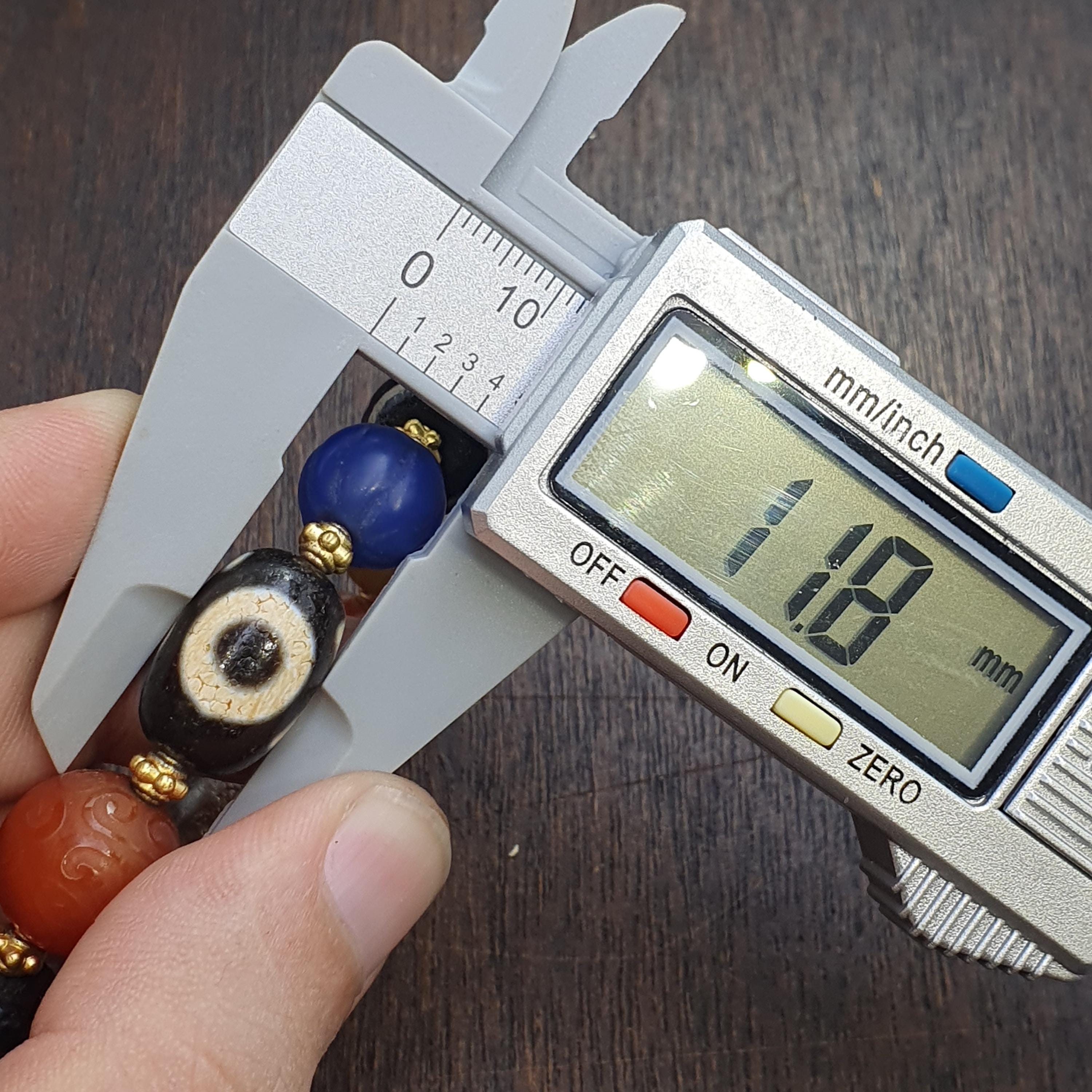 Tibetan Dzi Agate Bead Bracelet – Nepalese Spiritual Motifs