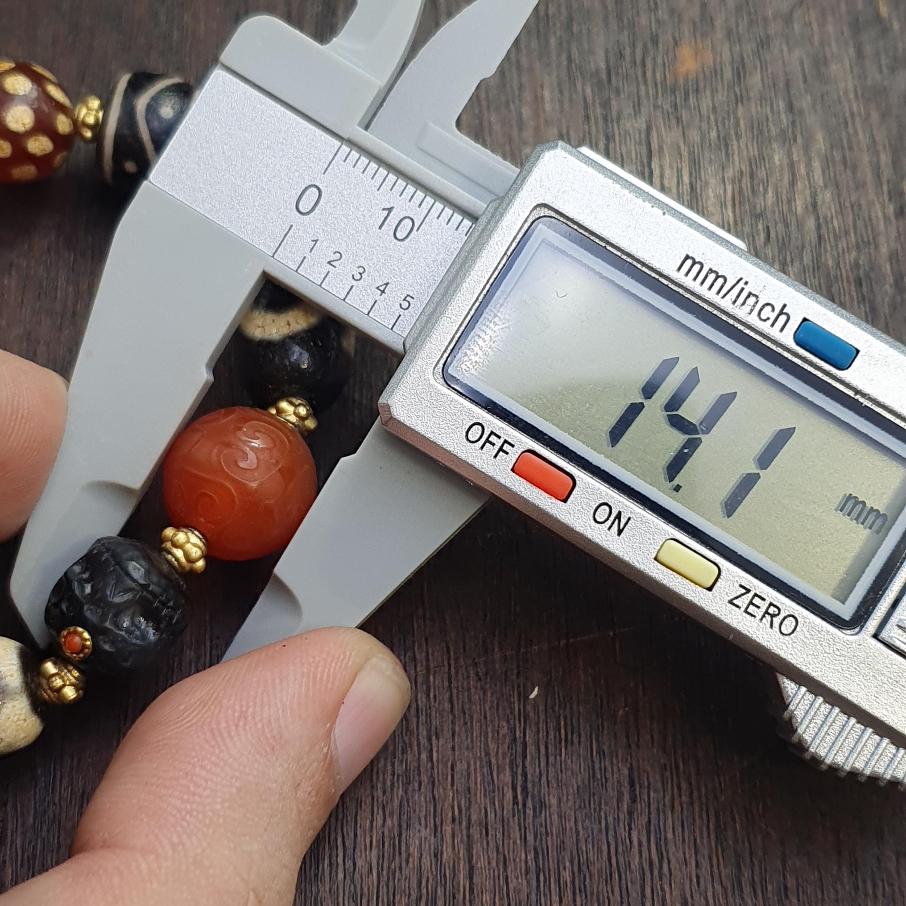 Tibetan Dzi Agate Bead Bracelet – Nepalese Spiritual Motifs