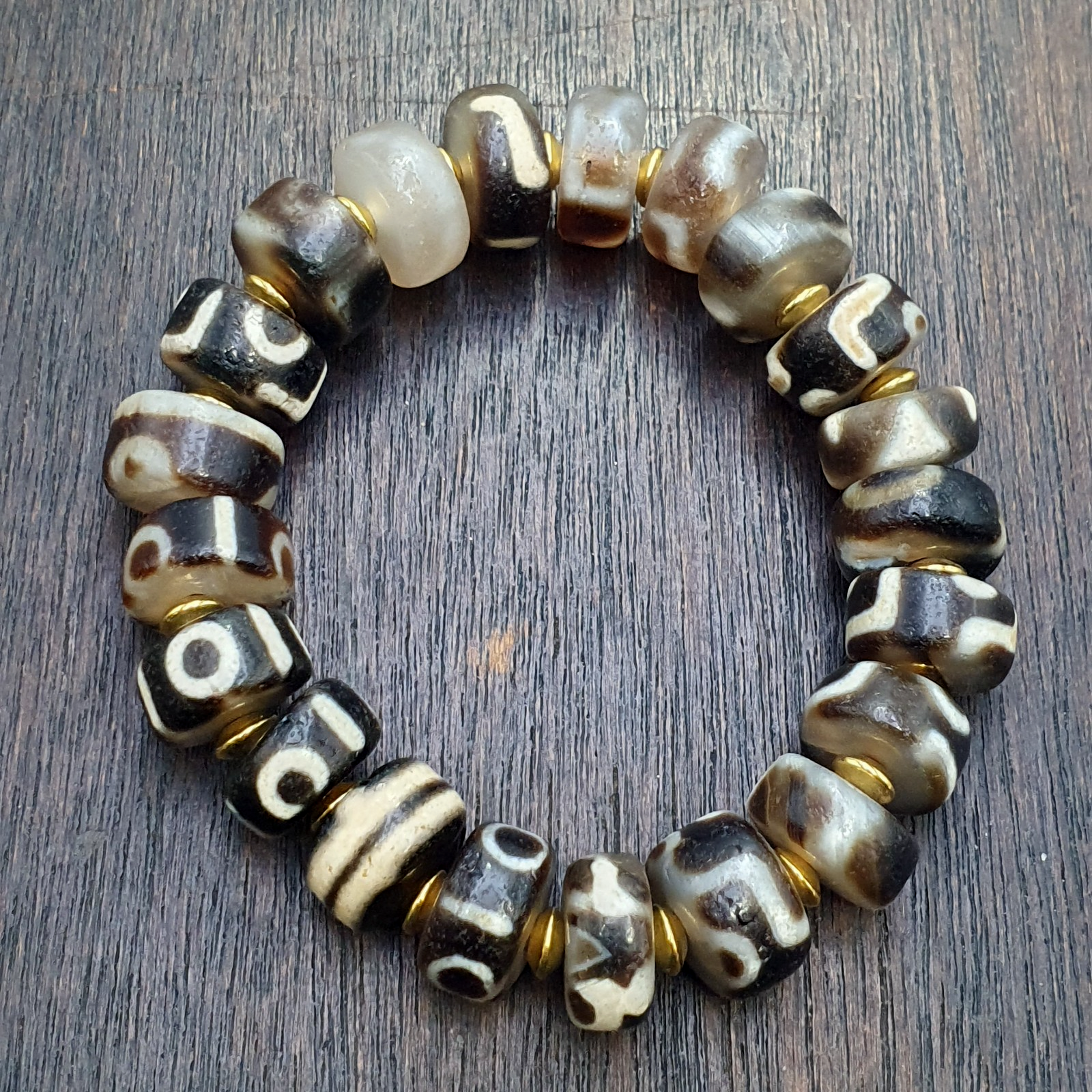 Tibetan nepalese dzi beads bracelet handmade cylindrical beads, gold spacers