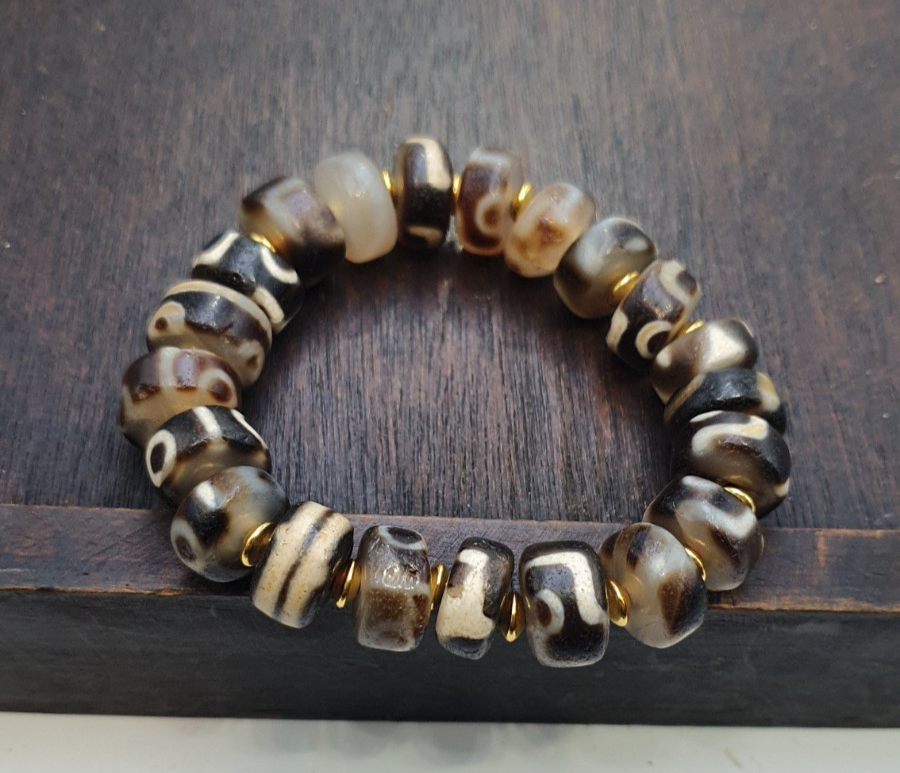 Tibetan nepalese dzi beads bracelet handmade cylindrical beads, gold spacers