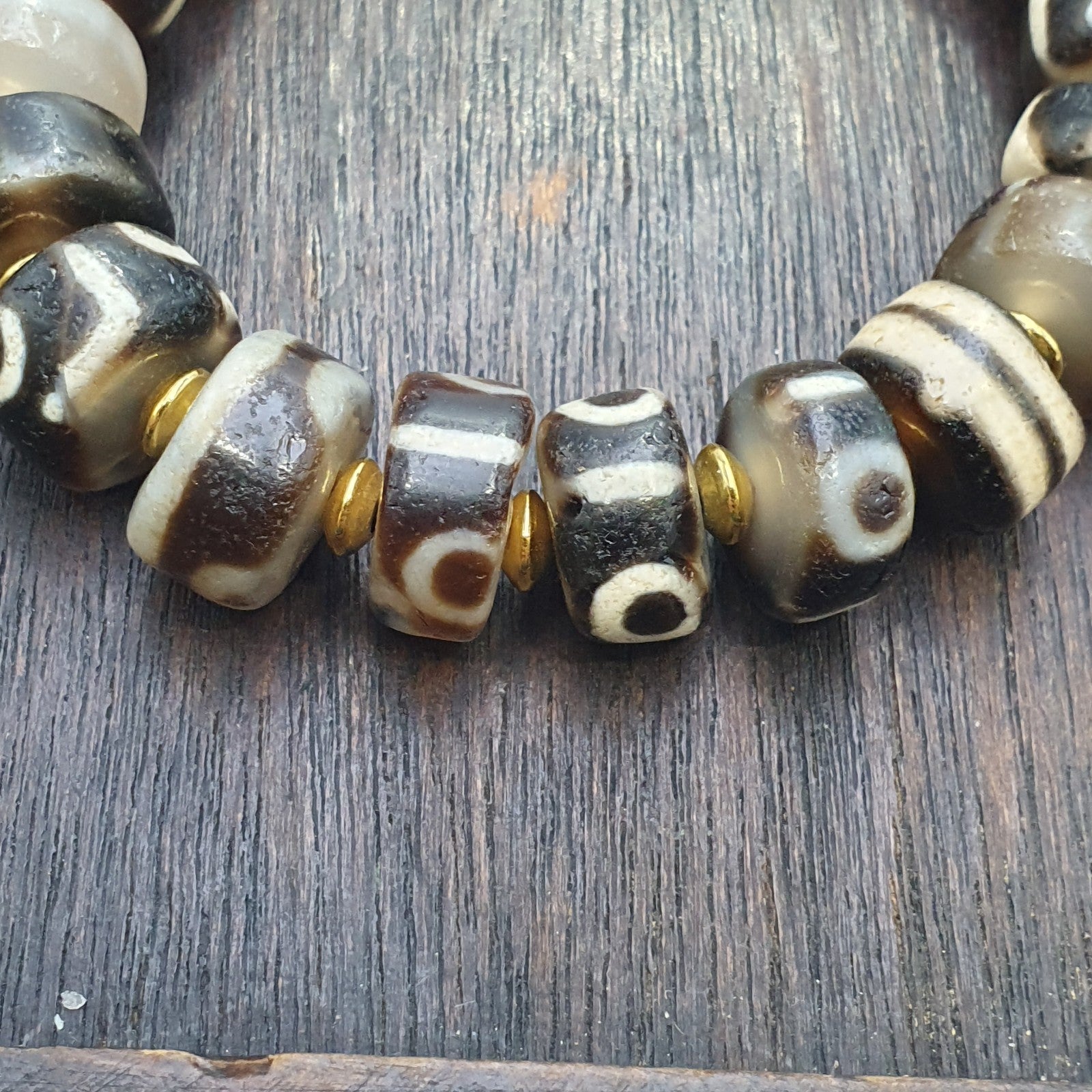 Tibetan nepalese dzi beads bracelet handmade cylindrical beads, gold spacers