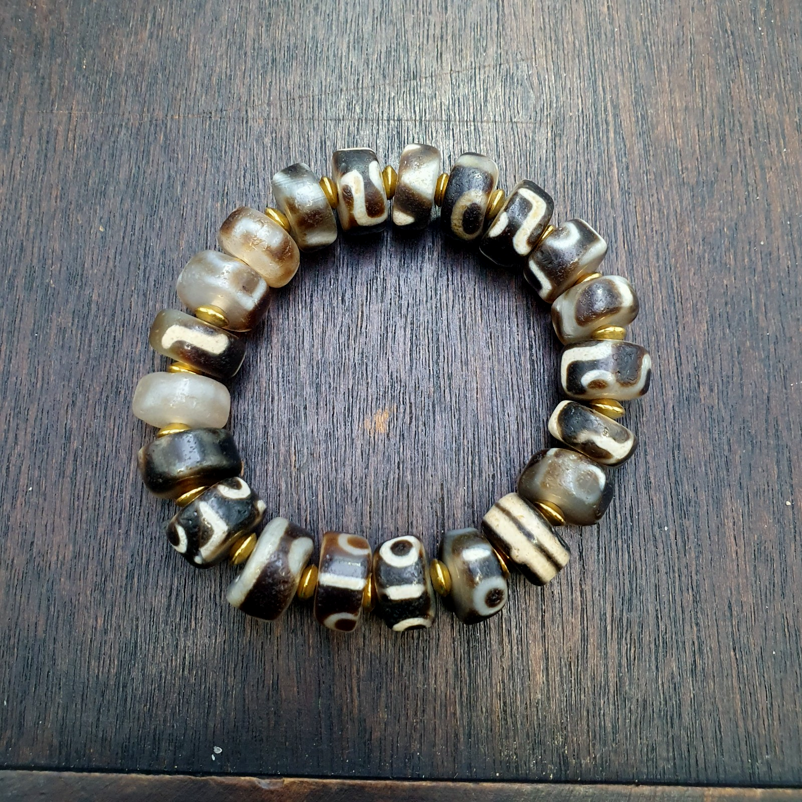 Tibetan nepalese dzi beads bracelet handmade cylindrical beads, gold spacers