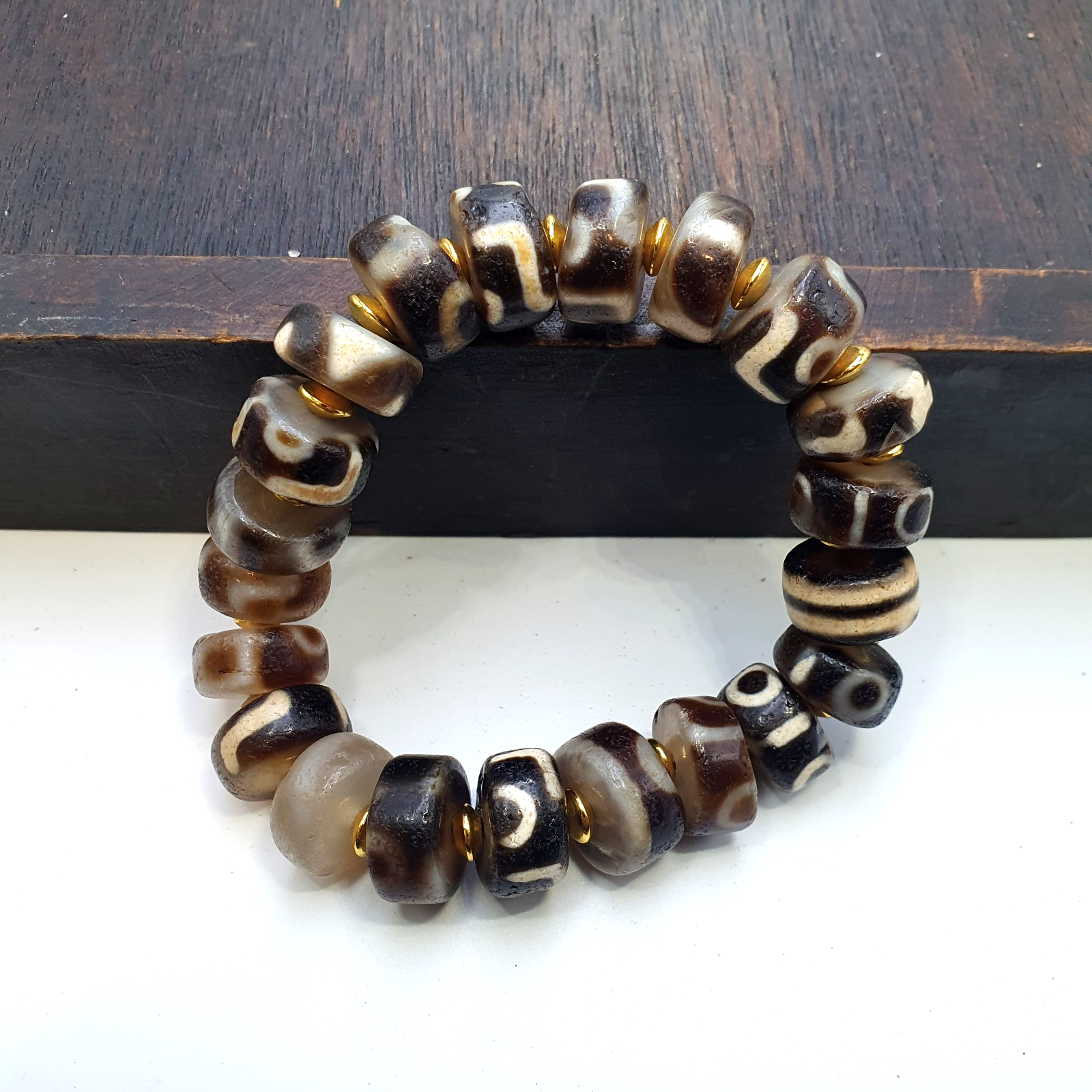 Tibetan nepalese dzi beads bracelet handmade cylindrical beads, gold spacers