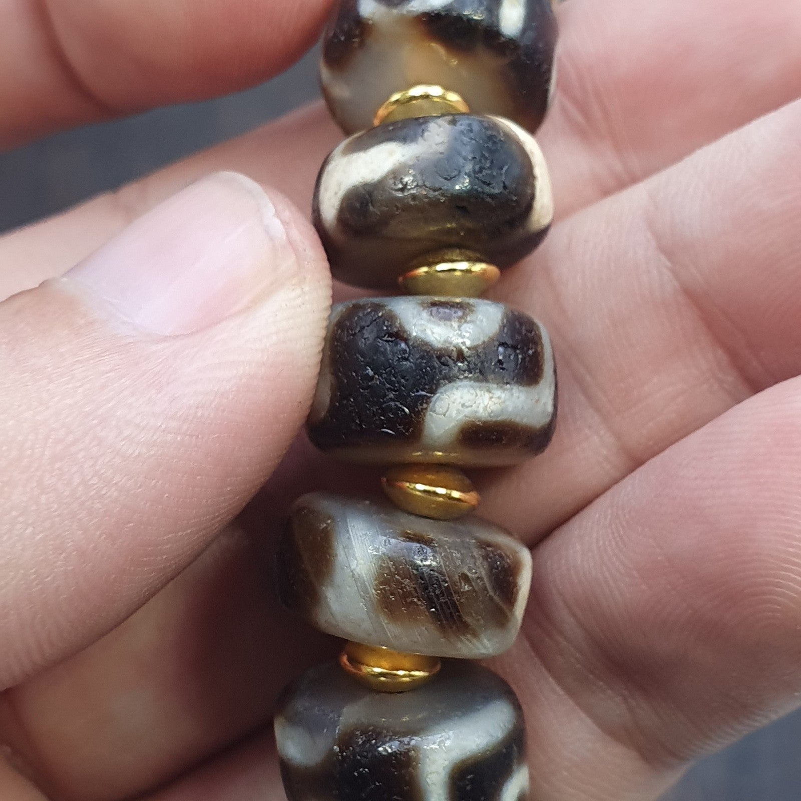 Tibetan nepalese dzi beads bracelet handmade cylindrical beads, gold spacers