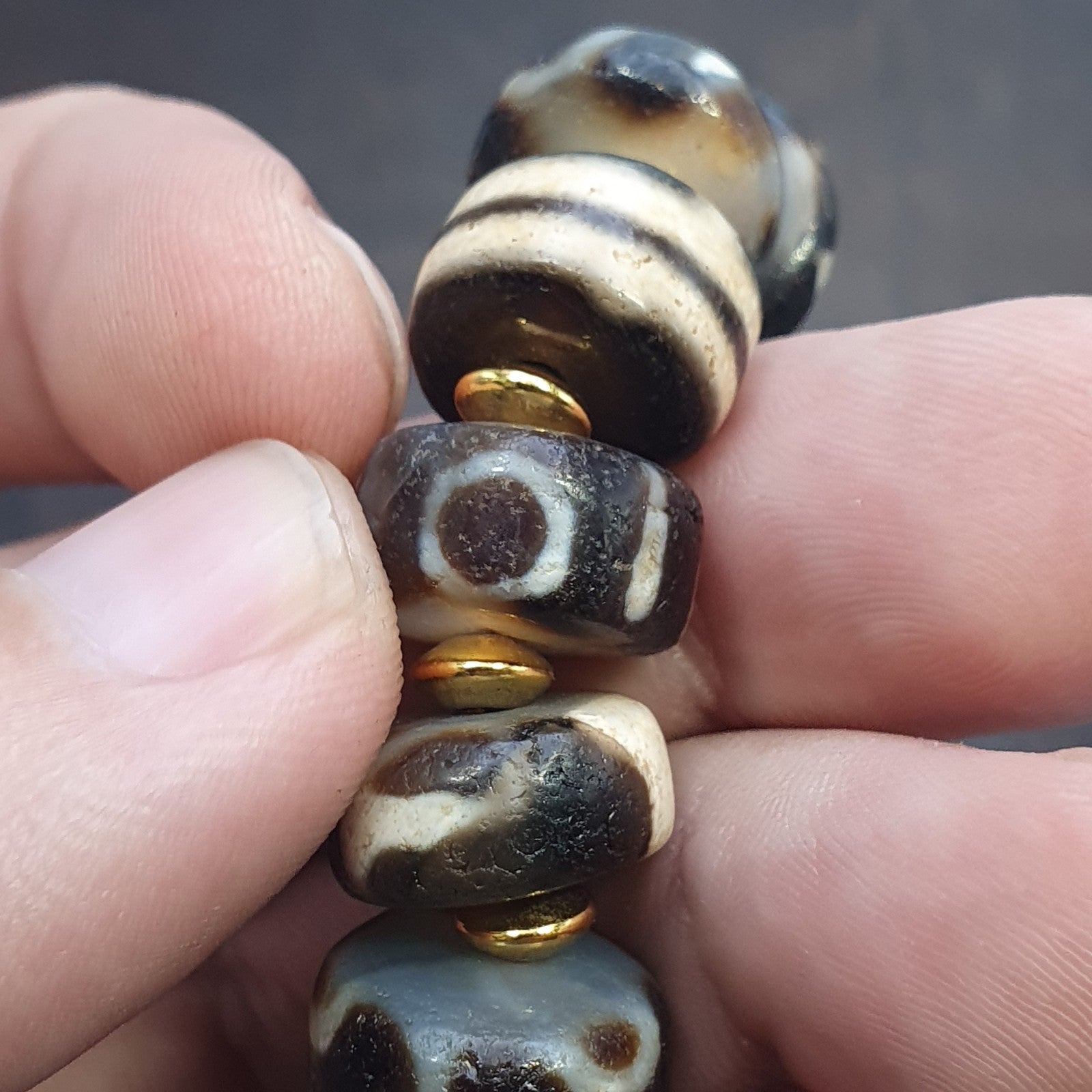 Tibetan nepalese dzi beads bracelet handmade cylindrical beads, gold spacers