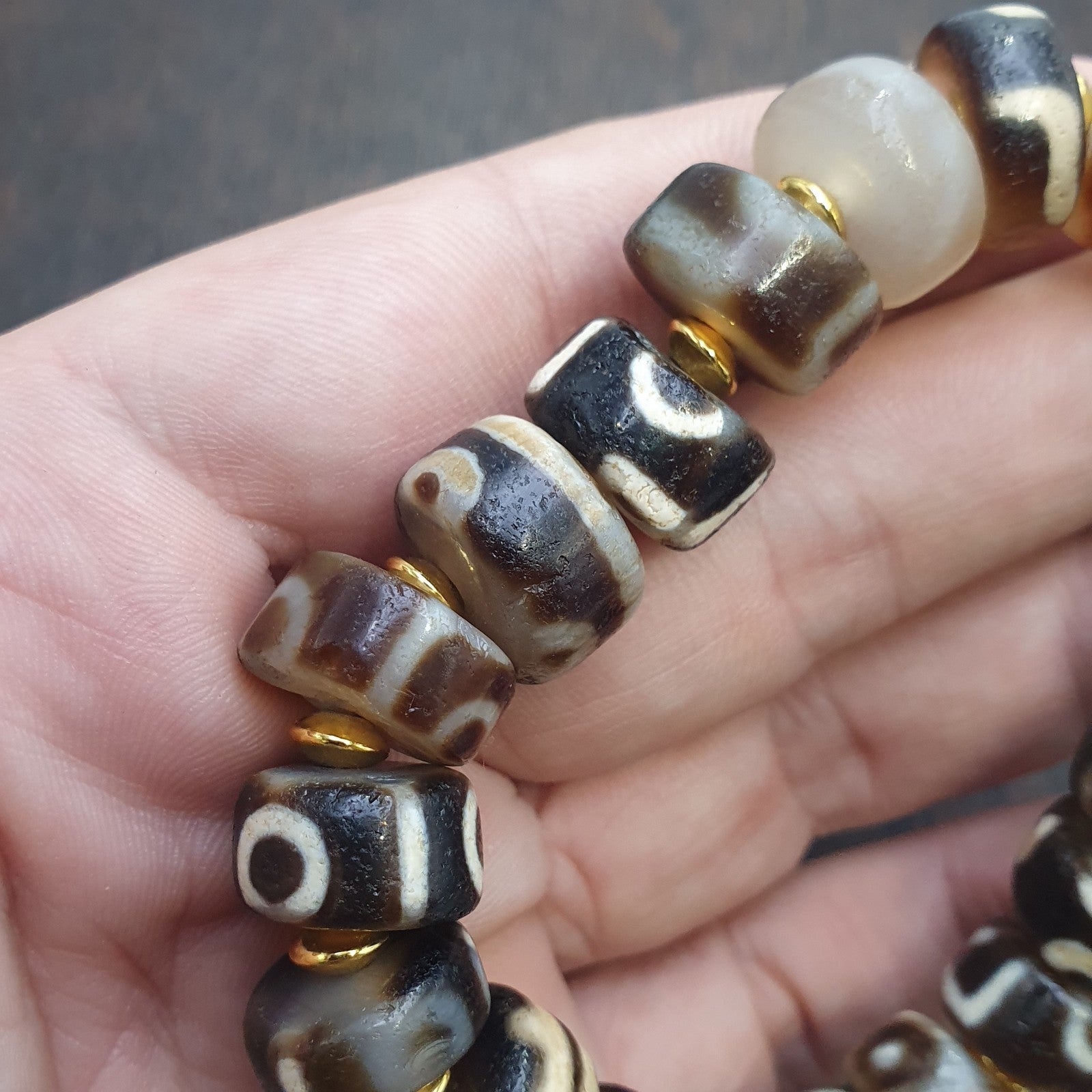 Tibetan nepalese dzi beads bracelet handmade cylindrical beads, gold spacers