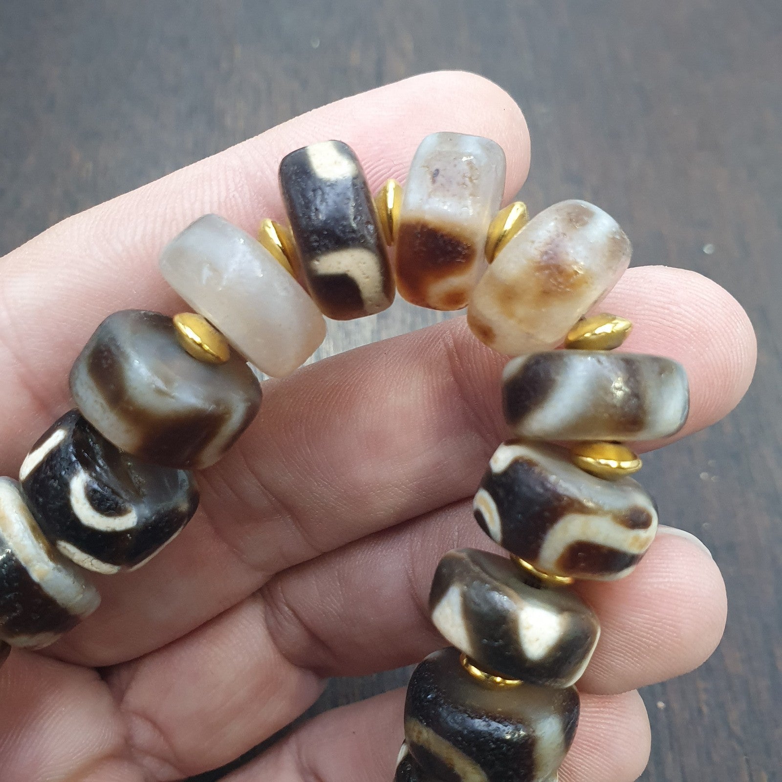 Tibetan nepalese dzi beads bracelet handmade cylindrical beads, gold spacers