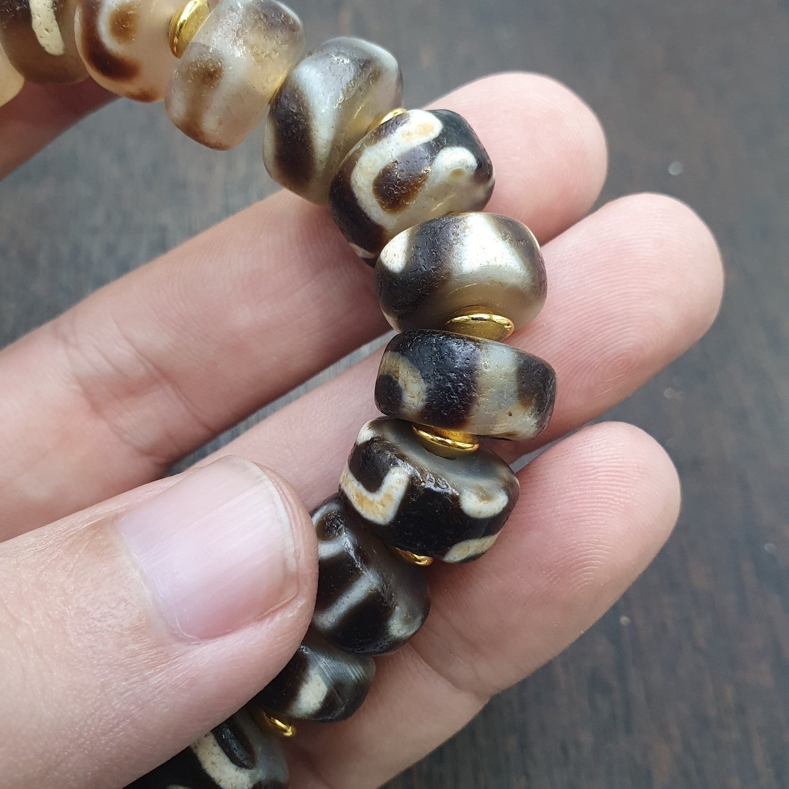 Tibetan nepalese dzi beads bracelet handmade cylindrical beads, gold spacers