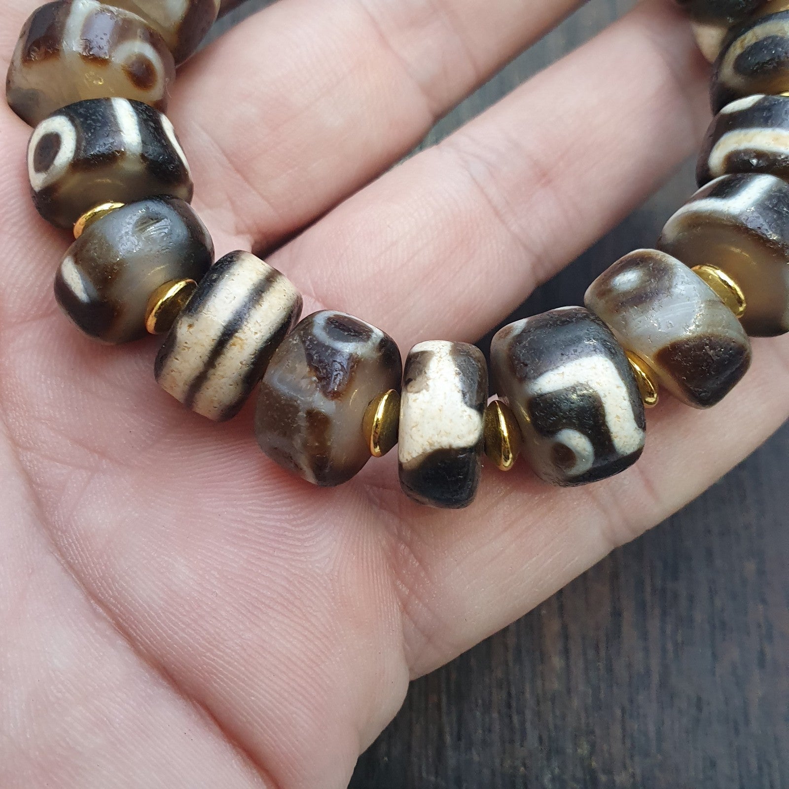 Tibetan nepalese dzi beads bracelet handmade cylindrical beads, gold spacers