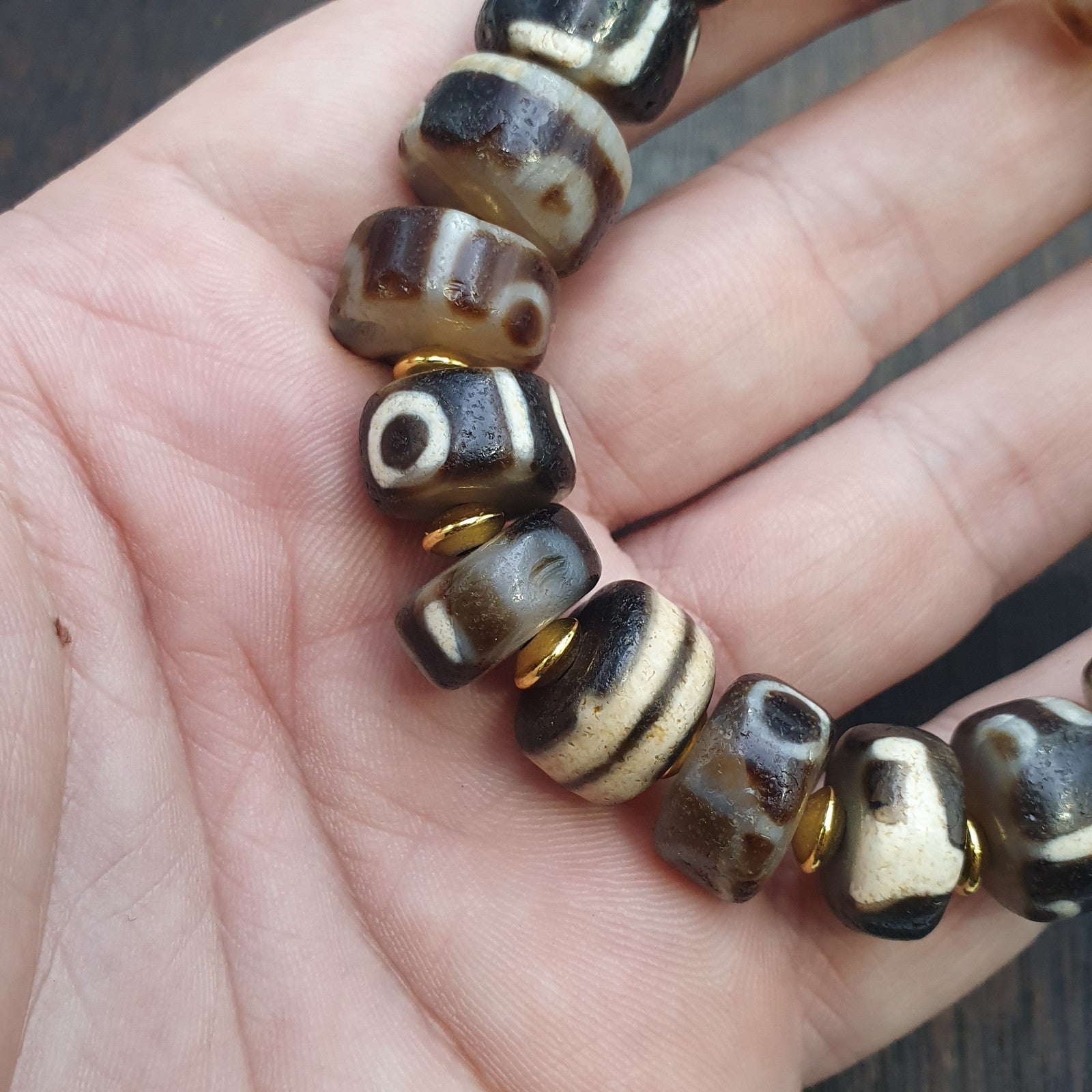 Tibetan nepalese dzi beads bracelet handmade cylindrical beads, gold spacers