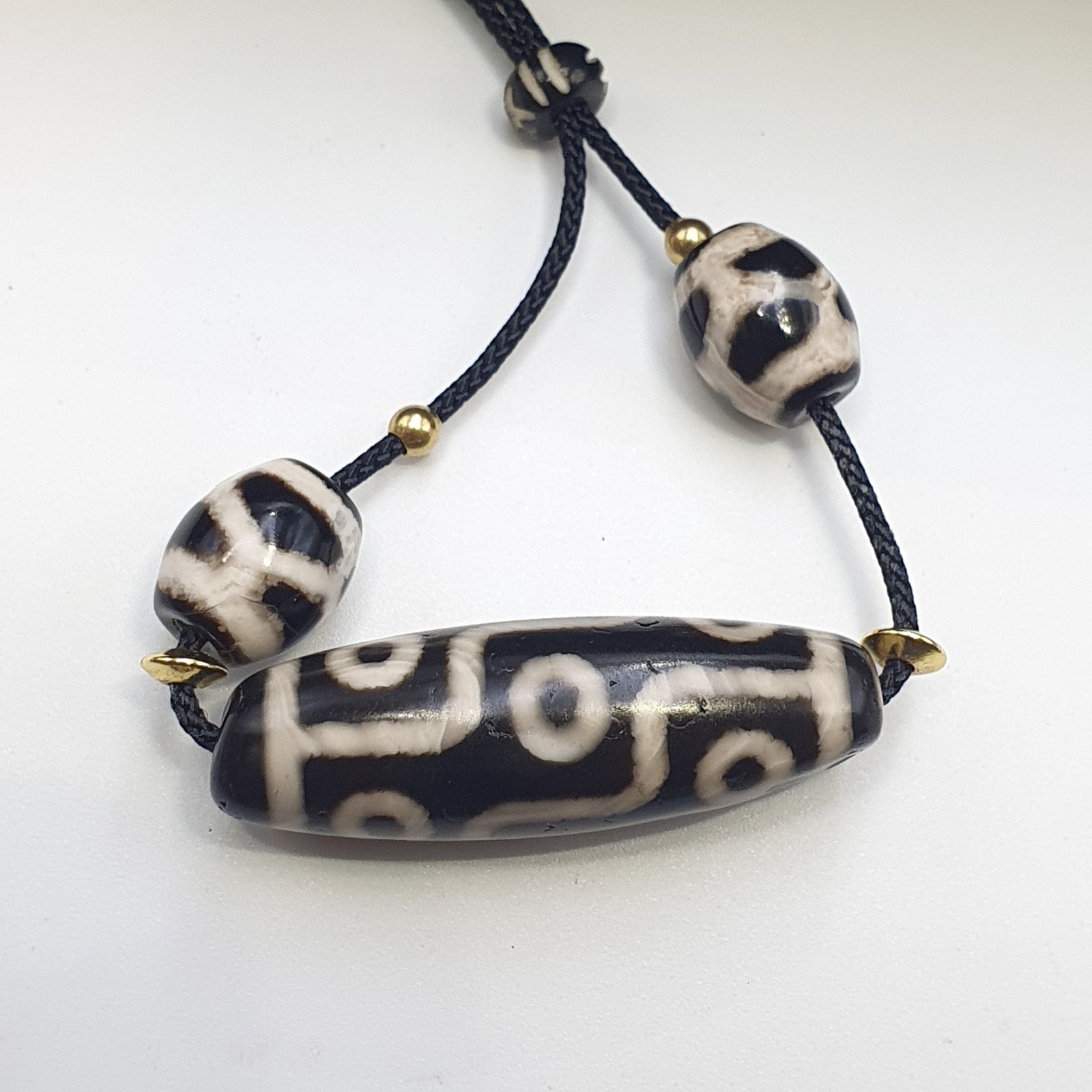 Tibetan tradition 3 agate dzi beads with 9 eyes and waves motifs spiritual mala