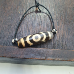 Tibetan tradition agate dzi beads with 3 eyes and waves motifs spiritual mala