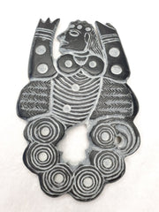 Ancient jiroft civilization black stone figure of mystical muscular men.