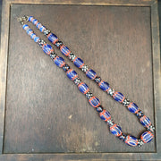 Antique venetian inspired african blue glass chevron and hundred eyes beads.