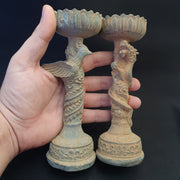 Pair of antique bronze figural candle stick holders dragon and bird figurine