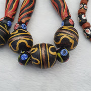 Vintage old mix glass feather and fancy beads beaded long necklace big beads .