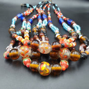 Vintage handcrafted old glass beads necklace.