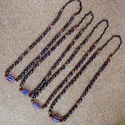 Venetian style beads old chevron skunk dotted eyes glass beads long strand.