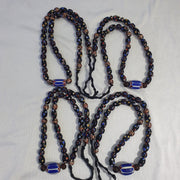 Venetian style beads old chevron skunk dotted eyes glass beads long strand.