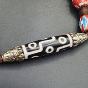9 falling eyes dzi bead pendant necklace with Tibetan silver and chevron beads – photo 2 of 5