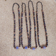 Venetian style beads old chevron skunk dotted eyes glass beads long strand.