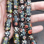 Vintage black gabri eyes skunk thousand eyes glass beads strand.