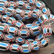 Vintage venetian african style blue glass chevron beads long strand 11x13mm.