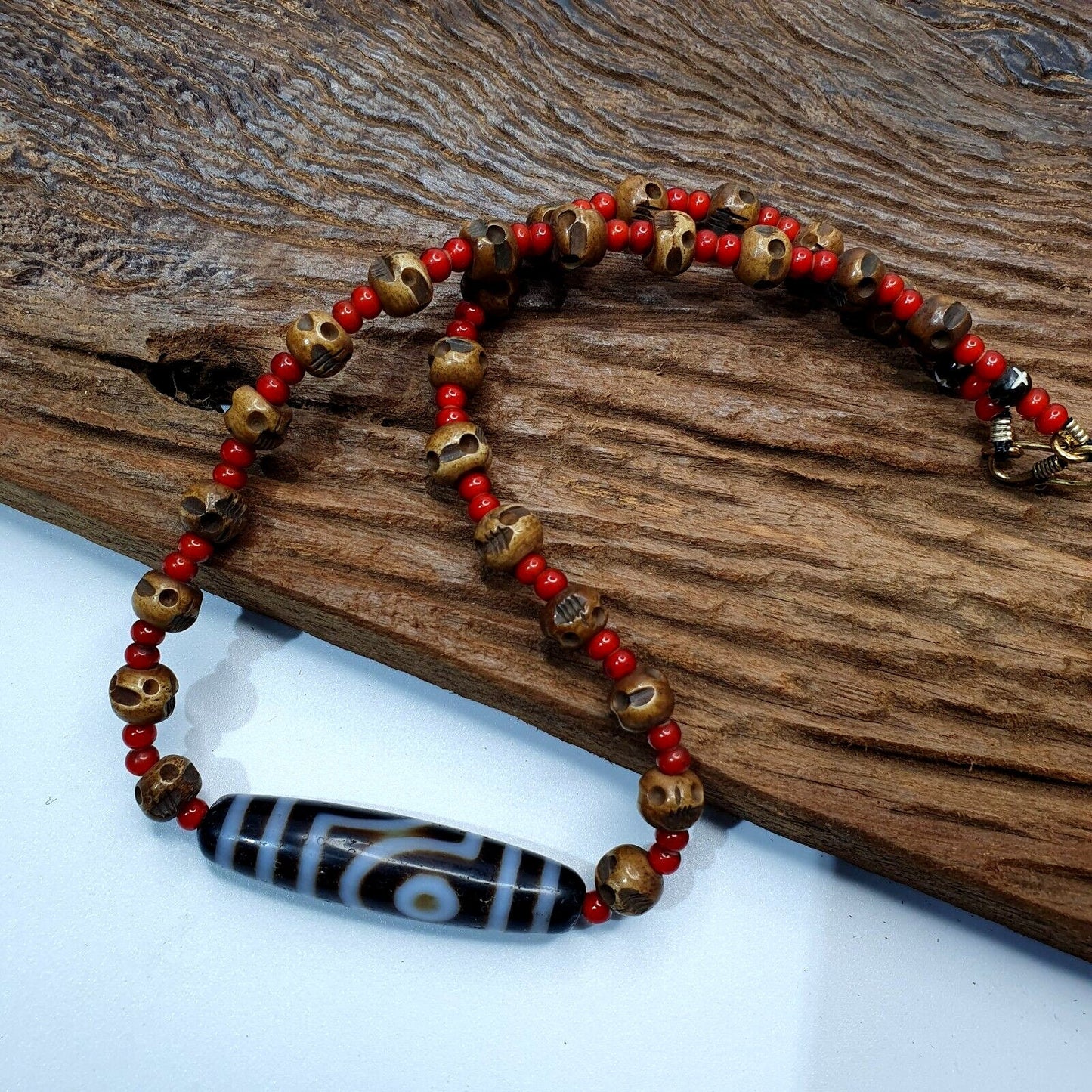 Antique vintage himalayan indo tibetan 2 eye agate, carving skull beads necklace